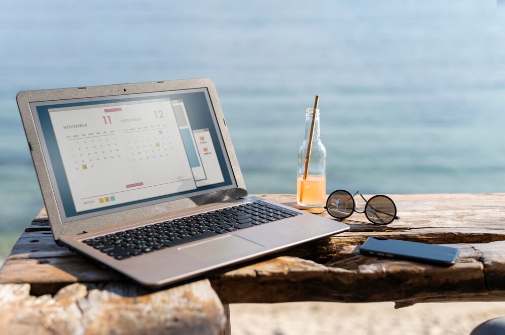 arrangement-with-laptop-at-seaside_23-2148968962.jpg